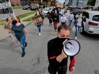 Protestors make their way down Union Street on their way to the site where Malcom Gracia was killed by police on Cedar Street in 2012.  PHOTO PETER PEREIRA