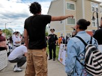 New Bedford police chief Joseph Cordeiro listens to concerns by protestors who feel they are not being well treated by police. The protest started at the intersection of Union Street and County Street in downtown New Bedford and then progressed to the site where Malcom Gracia was killed by police on Cedar Street in 2012.  PHOTO PETER PEREIRA