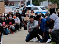 Protestors gather at the site where Malcom Gracia was killed by police on Cedar Street in 2012.  PHOTO PETER PEREIRA