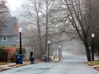 A sole cyclist makes his way up an empty Hawthorn Street in downtown New Bedford on a Friday morning which is usually busy with activity.  [ PETER PEREIRA/THE STANDARD-TIMES/SCMG ]