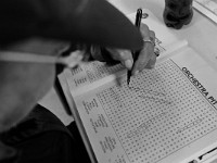 A resident works on a word game at the House of Hope homeless shelter on Mount Pleasant Street in New Bedford.