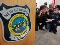 JJ Montalban, 6, who was born with congenial heart defects, is sworn in as an honorary New Bedford police officer by police chief, Paul Oliveira at a ceremony held at police headquarters on Rockdale Avenue in New Bedford.  JJ Montalban is currently in need of a heart transplant.  PHOTO PETER PEREIRA