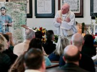 Pastor Paul Wheeler of the Trinity Lutheran Church speaks to the family of Mark Cormier Jr., during a service in celebration of his life held at the Seamen's Bethel in New Bedford.  Mark Cormier Jr., 35, along with two other fishermen were lost at sea aboard the New Bedford fishing vessel Leonardo on November 24, 2019.    PHOTO PETER PEREIRA