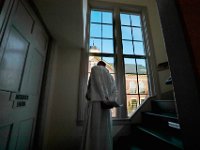 Pastor Paul Wheeler of the Trinity Lutheran Church looks out the windows of the Seamen's Bethel before beginning a service in celebration of the life of Mark Cormier Jr.    Mark Cormier Jr., 35, along with two other fishermen were lost at sea aboard the New Bedford fishing vessel Leonardo on November 24, 2019.   PHOTO PETER PEREIRA