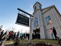 Family and friends line up to enter the Seamen's Bethel in downtown New Bedford for a service in celebration of the life of Mark Cormier Jr. Mark Cormier Jr., 35, along with two other fishermen were lost at sea aboard the New Bedford fishing vessel Leonardo on November 24, 2019.    PHOTO PETER PEREIRA