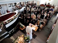 Pastor Paul Wheeler of the Trinity Lutheran Church conducts a service in celebration of the life of Mark Cormier Jr. held at the Seamen's Bethel in New Bedford.  Mark Cormier Jr., 35, along with two other fishermen were lost at sea aboard the New Bedford fishing vessel Leonardo on November 24, 2019.    PHOTO PETER PEREIRA