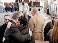 New Bedford mayor Jon Mitchel offers comfort to Mark Cormier Jr's mother, Annette Blankenship durin a service in celebration of the life of Mark Cormier Jr. held at the Seamen's Bethel in New Bedford.  Mark Cormier Jr., 35, along with two other fishermen were lost at sea aboard the New Bedford fishing vessel Leonardo on November 24, 2019.    PHOTO PETER PEREIRA