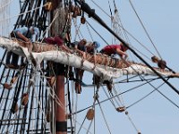 Crew members unfurl the sails of the Mayflower II as it performs sea trials under sail in Buzzards Bay after an unexpected stop in New Bedford harbor.  PHOTO PETER PEREIRA