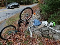A vehicle makes its way up Potomska Road in Dartmouth past a Halloween display on the side of the road.  PHOTO PETER PEREIRA