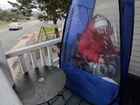 Lillian Goneville set up two small tents on the porch outside her home in Fairhaven to spend sometime outside while staying warm and still being isolated.  PHOTO PETER PEREIRA