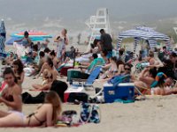 Beachgoers take advantage of the weather to enjoy a hot day at Horseneck Beach in Westport.