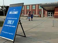 A sign outlines the limit to school grounds as students arrive to the Leroy Wood School in Fairhaven for the first day of school.  This is the first time that students have been allowed back to the school since March.  PHOTO PETER PEREIRA