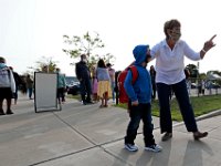 A teacher offers some guidance to an arriving student after he makes his way past the litmit where parents are able to enter for the first day of school at the Leroy Wood School in Fairhaven.  This is the first time that students have been allowed back to the school since March.  PHOTO PETER PEREIRA