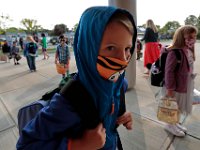 Students arrive for their first day of school  at the Leroy Wood School in Fairhaven with a variety of mask patterns.  This is the first time that students have been allowed back to the school since March.  PHOTO PETER PEREIRA