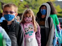 A variety of masks were on display as students arrive for the first day of school at the Leroy Wood School in Fairhaven.  This is the first time that students have been allowed back to the school since March.  PHOTO PETER PEREIRA