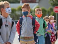 Kindergartners are socially distanced before making their way into the Leroy Wood School in Fairhaven for the first day of school.  This is the first time that students have been allowed back to the school since March.  PHOTO PETER PEREIRA