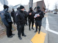 Massachusetts State Police officers search for Kenneth Parks who was reported missing Wednesday afternoon in Fairhaven. Mr. Parks was found by a homeowner sitting in her car parked in her driveway on Chestnut Street.