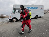 New Bedford police officer, Scott Gordon, preapres to dive into waters off of Fairhaven in search for Kenneth Parks who was reported missing Wednesday afternoon in Fairhaven. Mr. Parks was found by a homeowner sitting in her car parked in her driveway on Chestnut Street.