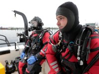 Billy Marsh, left, and Scott Gordron prepare to dive in search for Kenneth Parks who was reported missing Wednesday afternoon in Fairhaven. Mr. Parks was found by a homeowner sitting in her car parked in her driveway on Chestnut Street.