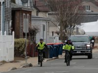 Police officers on bicycles make their way down Middles Street in search for Kenneth Parks who was reported missing Wednesday afternoon in Fairhaven. Mr. Parks was found by a homeowner sitting in her car parked in her driveway on Chestnut Street.