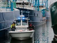 Fairhaven harbormaster escorts a diving team to the docks behind Lindbergh Marine in search for Kenneth Parks who was reported missing Wednesday afternoon in Fairhaven. Mr. Parks was found by a homeowner sitting in her car parked in her driveway on Chestnut Street.