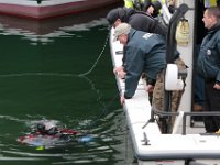 A diver makes his way into the waters behind Lindbergh Marine in search for Kenneth Parks who was reported missing Wednesday afternoon in Fairhaven. Mr. Parks was found by a homeowner sitting in her car parked in her driveway on Chestnut Street.