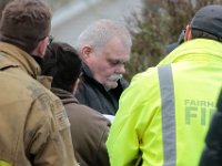 Fairhaven firefighters help Kenneth Parks out of the car he was found in by a homeowner on Chestnut Street in Fairhaven, after he was reported missing on Wednesday.