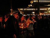 Umass Dartmouth students and staff hold candles during a candlelight vigil to honor Frankie Petillo Jr. who died after geing hit by a car, and Alexandra Landra who died unexpectedly in a separate incident.