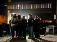 Family and friends seek comfort in each other at a Umass Dartmouth candlelight vigil to honor Frankie Petillo Jr. who died after geing hit by a car, and Alexandra Landra who died unexpectedly in a separate incident.