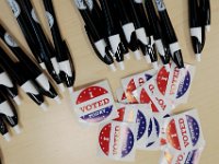 Pens and stickers were handed out to those who cast their vote in person for the 2020 Presidential election.  [ PETER PEREIRA/THE STANDARD-TIMES/SCMG ]