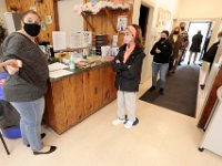 Voters line up to cast their ballots inside of the Buttonwood Warming House polling station in New Bedford.  [ PETER PEREIRA/THE STANDARD-TIMES/SCMG ]