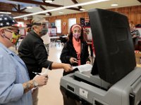 First time voter, Alexia Vieira, casts her first vote at the Buttonwood Warming House polling station in New Bedford.  [ PETER PEREIRA/THE STANDARD-TIMES/SCMG ]