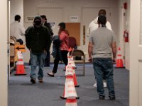 Voters file in and out of the Dartmouth Town Hall polling station for the 2020 Presidential election.  [ PETER PEREIRA/THE STANDARD-TIMES/SCMG ]