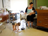 Amanda Fielding spends time with her newborn Braylin Debonise, 9 days old, and her twenty month old, Briella Debonise, at St. Lukes Hospital in New Bedford, MA on June 7, 2016.  Amanda a recovering heroin addict, has seen both of her daughters born with an addiction to methadone.  Braylin is given a combination of morphine and Phenobarbital with her formula daily, while Briella has already been weaned off her addiction.