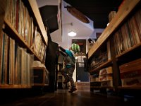 Mace Sullivan struggles to reach the joystick as he plays a round of Galaga at the newly opened Purchase Street Records in downtown New Bedford.   PETER PEREIRA/THE STANDARD-TIMES/SCMG