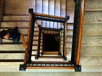 A man makes his way up the spiraling staircase to the third floor of City Hall in downtown New Bedford.   PETER PEREIRA/THE STANDARD-TIMES/SCMG