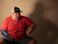 Ray Tetreault, an avid hockey fan/player, lost his right arm and part of his left hand after being jolted by 15,000 volts of electricity when he and a co-worker were working at Woods Hole in Cape Cod in 1999.  His friend was killed and Mr. Tetreault has had 26 surgeries since the accident.   PETER PEREIRA/THE STANDARD-TIMES/SCMG