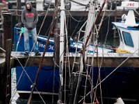 The owner of the bay scalloper Elizabeth Jessica is at a loss for words after finding his boat had sunk overnight at its dock on Pope's Island in New Bedford.  With no insurance, he is unsure how he will salvage the vessel.   PETER PEREIRA/THE STANDARD-TIMES/SCMG