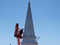 Centerline Communications workers work outside and inside the steeple of Saint Mary's church in Padanaram.   PETER PEREIRA/THE STANDARD-TIMES/SCMG