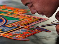 Tibetan Monks from the Drepung Loseling Monastery create a mandala sand paiting in the UMass Dartmouth Library as part of a week-long celebration of the Mystical Arts of Tibet.   PETER PEREIRA/THE STANDARD-TIMES/SCMG