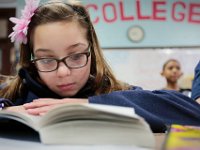 Fifth grader, Raleigh Sylvia works on her literacy assignment at the Alma Del Mar charter school in New Bedford, which is celebrating its 5th anniversary.   PETER PEREIRA/THE STANDARD-TIMES/SCMG