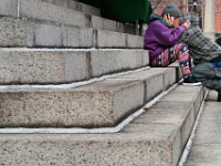 A couple enjoy a moment together on the steps of the New Bedford downtown library.   PETER PEREIRA/THE STANDARD-TIMES/SCMG