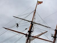 Crewmembers of the Pride of Baltimore II are seen high above the deck of the 1812-era topsail schooner reproduction with its iconic sloping masts designed for speed.  The ship docked at State Pier in New Bedford due to the high winds sweeping across the region, as it makes its way southward towards its home in Maryland.  PHOTO PETER PEREIRA/THE STANDARD-TIMES/SCMG