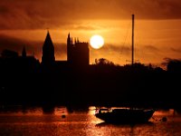 The sun rises above the iconic skyline of Fairhaven.   PETER PEREIRA/THE STANDARD-TIMES/SCMG