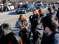 Students from the Somerset Berkley Regional High School lining the road as the hearse drives toward Saint Thomas More Church for the funeral mass of Somerset Fire Chief Scott Jepson in Somerset.  Chief Jepson was then buried at the Nathan Slade Cemetery in Somerset.  PHOTO PETER PEREIRA