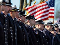 Firefighters from across two states stand at attention in front of the funeral mass of Somerset Fire Chief Scott Jepson held at Saint Thomas More Church on Luther Avenue in Somerset.  Chief Jepson was then buried at the Nathan Slade Cemetery in Somerset.  PHOTO PETER PEREIRA