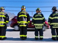 Firefighters from various districts stand at attention in front of the Somerset fire station, waiting for the procession to file past after the funeral mass of Somerset Fire Chief Scott Jepson held at Saint Thomas More Church on Luther Avenue in Somerset.  Chief Jepson was then buried at the Nathan Slade Cemetery in Somerset.  [ PETER PEREIRA/THE STANDARD-TIMES/SCMG ]