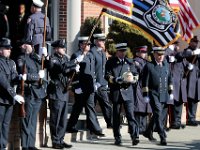 Somerset firefighters carry the helmet of Somerset Fire Chief Scott Jepson after the funeral mass held at Saint Thomas More Church on Luther Avenue in Somerset.  Chief Jepson was then buried at the Nathan Slade Cemetery in Somerset.  [ PETER PEREIRA/THE STANDARD-TIMES/SCMG ]