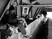 Lucio, left, a mechanic who cant find work, shares the spaces under the overpass with Jefferey who since injuring his ankle has not been able to work at the only job he knows how to do, fishing.  Three men's recent change in fortunes have forced them to make their home under the 195 overpass due to circumstances that they could not have imagined. No living homeless, they live on a day to day basis hoping for a change in their luck.