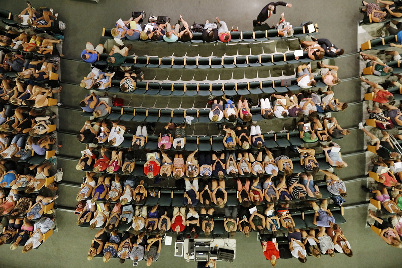 All Dartmouth school teachers meet in the Dartmouth High School auditorium to listen to Bill Daggett, top,  speak about the future of education as part of an all day professional development day in preparation for the school year which begins tomorrow. PHOTO PETER PEREIRA